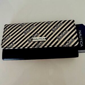 Nautica signature, striped bifold wallet with silver hardware.